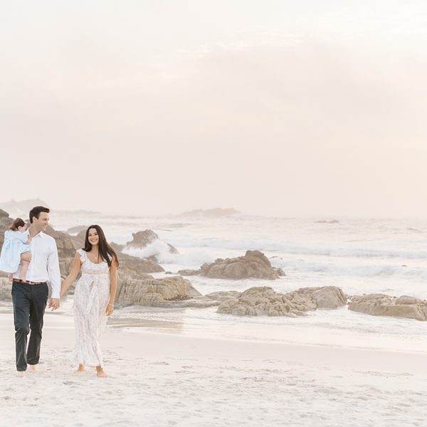 Young family walking at Carmel beach